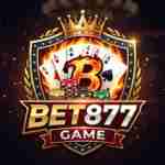 Professional logo for Bet877 Game featuring a golden crown, a flaming "B" shield, poker cards, and chips on a dark casino background.